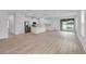 Open-concept kitchen with stainless steel appliances and large island at 506 Marion Oaks Trl, Ocala, FL 34473