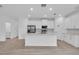 Kitchen with island, stainless steel appliances and white cabinets at 506 Marion Oaks Trl, Ocala, FL 34473