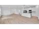 Bright kitchen with stainless steel appliances, island and white cabinets at 506 Marion Oaks Trl, Ocala, FL 34473
