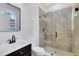 Updated bathroom with tile surround shower, vanity, and modern fixtures at 5116 Sorrento W Blvd, St Cloud, FL 34771