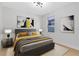 Bedroom featuring modern décor, a comfortable bed, and bright natural light at 5116 Sorrento W Blvd, St Cloud, FL 34771