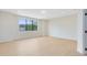Spacious bedroom with large window offering ample natural light and smooth floors at 5116 Sorrento W Blvd, St Cloud, FL 34771