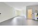 Spacious two-car garage with painted floor, ample lighting and separate entry to laundry room at 5116 Sorrento W Blvd, St Cloud, FL 34771