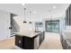 Spacious kitchen featuring an island with a sink and stainless steel appliances at 5116 Sorrento W Blvd, St Cloud, FL 34771