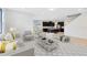 Open-concept living room with modern decor and access to the kitchen at 5116 Sorrento W Blvd, St Cloud, FL 34771