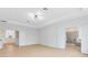 Spacious primary bedroom offering smooth floors and ensuite bath with glass shower at 5116 Sorrento W Blvd, St Cloud, FL 34771