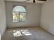 Inviting bedroom with a large window, perfect for enjoying natural light and outdoor views at 5291 Images Cir # 301, Kissimmee, FL 34746