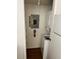 This is the laundry area featuring a stackable washer and dryer, and electrical panel at 5291 Images Cir # 301, Kissimmee, FL 34746