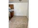 Open-concept living space with neutral carpet and lots of natural light at 5291 Images Cir # 301, Kissimmee, FL 34746