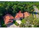 House aerial with pin drop showing convenient location near road, golf course, and lake at 602 Nighthawk Cir, Winter Springs, FL 32708