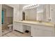 Bright bathroom with double sinks, large mirror, and tiled floor at 602 Nighthawk Cir, Winter Springs, FL 32708