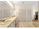Bathroom features double sinks, large mirror, and lots of cabinet space at 602 Nighthawk Cir, Winter Springs, FL 32708