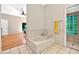 Bathroom with bathtub, colorful towels, and tiled floors at 602 Nighthawk Cir, Winter Springs, FL 32708