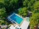 Large community pool and hot tub offer residents ample space for relaxation and recreation at 602 Nighthawk Cir, Winter Springs, FL 32708