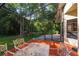 Screened patio area with a table and chairs at 602 Nighthawk Cir, Winter Springs, FL 32708