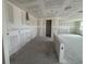 Unfinished bathroom features exposed plumbing, ready for custom fixtures and finishes; drywall ready at 706 Junonia Blvd, New Smyrna Beach, FL 32168