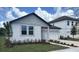 Charming single-story home with a brick driveway and well-maintained landscaping at 706 Junonia Blvd, New Smyrna Beach, FL 32168