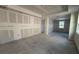 Unfinished living room featuring concrete floors and large window at 706 Junonia Blvd, New Smyrna Beach, FL 32168