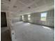 Unfinished living room with windows showcasing a vast space ready for personalization and drywall at 706 Junonia Blvd, New Smyrna Beach, FL 32168