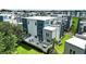 Aerial view of the back of the home showcasing the patio and balcony at 7770 Sandy Ridge Dr # 234, Reunion, FL 34747