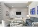 Contemporary living room with modern furnishings, stylish decor, and tile flooring at 7770 Sandy Ridge Dr # 234, Reunion, FL 34747