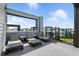 Relax on the rooftop deck featuring lounge chairs and a view of the surrounding community at 7770 Sandy Ridge Dr # 234, Reunion, FL 34747