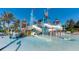 Vibrant water park featuring slides and water features at 7770 Sandy Ridge Dr # 234, Reunion, FL 34747