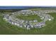 Drone shot of a new development community, with a pool and playground and lots of green space at 7779 Trapani Loop, Clermont, FL 34714