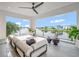 A spacious balcony with stylish seating and a scenic lake view at 8157 Elion St, Orlando, FL 32827