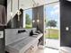 Modern bathroom featuring a concrete sink, sleek fixtures, and natural light with a view at 8157 Elion St, Orlando, FL 32827