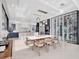 Stylish dining area adjacent to a modern kitchen and wine display at 8157 Elion St, Orlando, FL 32827