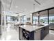 Bright kitchen with stainless steel appliances, modern finishes, and scenic water views at 8157 Elion St, Orlando, FL 32827