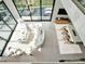 Aerial view of a modern living room with dining area and outdoor access at 8157 Elion St, Orlando, FL 32827