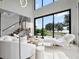 Modern living room with high ceilings, large windows, and water views at 8157 Elion St, Orlando, FL 32827