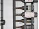 Close-up of wine bottles in a modern wine rack at 8157 Elion St, Orlando, FL 32827