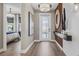 Modern hallway with decorative wall accents, leading to a bedroom, and a frosted glass door at 940 Club Cresswind Dr, Lady Lake, FL 32159