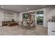Inviting outdoor lanai area features built in grill and seating for entertaining at 940 Club Cresswind Dr, Lady Lake, FL 32159