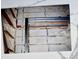 Garage insulation and framing, showcasing the construction details of the building's interior at 100 Demens St, Oakland, FL 34760