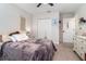 Inviting bedroom featuring a plush bed, closet, and dresser at 1073 River Otter Way, Deland, FL 32720