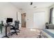 Bedroom with a large desk, closet, and ceiling fan at 1073 River Otter Way, Deland, FL 32720