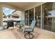 Outdoor patio including grill, seating and sliding glass doors at 1073 River Otter Way, Deland, FL 32720