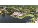 Lovely waterfront townhomes with private docks and screened patios on a tranquil, lily-pad filled lake at 1085 Island Way, Leesburg, FL 34748