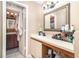 Clean bathroom featuring a neutral color scheme and plenty of counter space at 109 Lakepointe Cir, Kissimmee, FL 34743