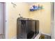 The laundry room is equipped with a modern washer and dryer at 109 Lakepointe Cir, Kissimmee, FL 34743