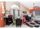 Inviting living space featuring comfortable furniture, a dining area, and stylish decor for modern living at 109 Lakepointe Cir, Kissimmee, FL 34743
