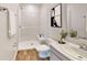 Modern bathroom with a sleek stand-up shower, contemporary fixtures, and clean, bright finishes at 1114 Camden W Way, Poinciana, FL 34758