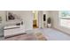 Serene bedroom with ample natural light, complemented by modern furnishings and ensuite bath at 1114 Camden W Way, Poinciana, FL 34758
