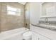 Bathroom featuring a shower/tub combination and vanity sink with granite countertops at 1118 Roberta Ave, Orlando, FL 32825