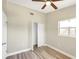 Comfortable bedroom featuring closet, fan and plenty of natural light at 1118 Roberta Ave, Orlando, FL 32825