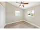 Cozy bedroom features lots of natural light from bright windows at 1118 Roberta Ave, Orlando, FL 32825